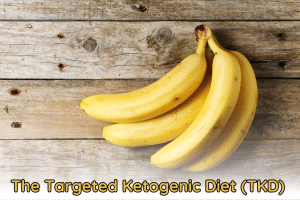 a photo of a banana on a wooden table with a word below it: The Targeted Ketogenic Diet (TKD)