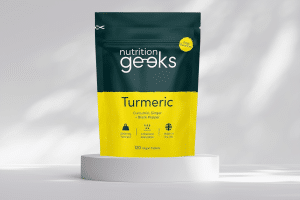 Turmeric Tablets by Nutrition Geeks on a small platform as one of the best keto supplements