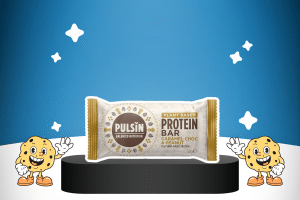 Caramel Chocolate & Peanut Vegan Protein Bars by Pulsin on a platform for best keto snacks
