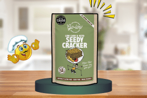 Keto Seedy Cracker Mix by GO-LOW on a green platform as one of the best keto-friendly baking mixes