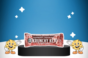 Krunchy Keto Bar Raspberry Cheesecake by GOOD GOOD on a platform for best keto snacks