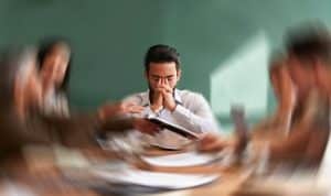 Stress, migraine and motion blur with a business man in a meeting feeling frustrated, tired or overworked. Mental health, anxiety and headache with an exhausted male employee suffering from fatigue.